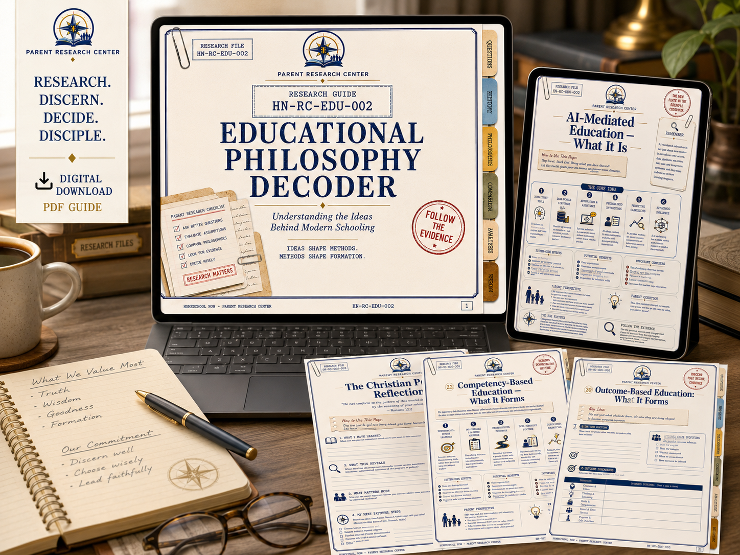 Educational Philosophy Decoder displayed on a research desk with digital screens, printed reference pages, notebook, and reading materials
